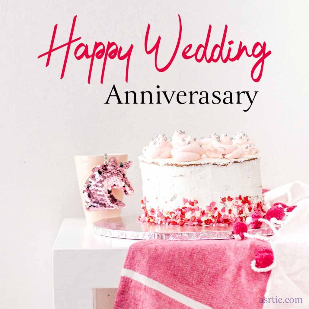 Image of Anniversary Quote with pink and red heart-shaped spreads over delectable cake on a white background