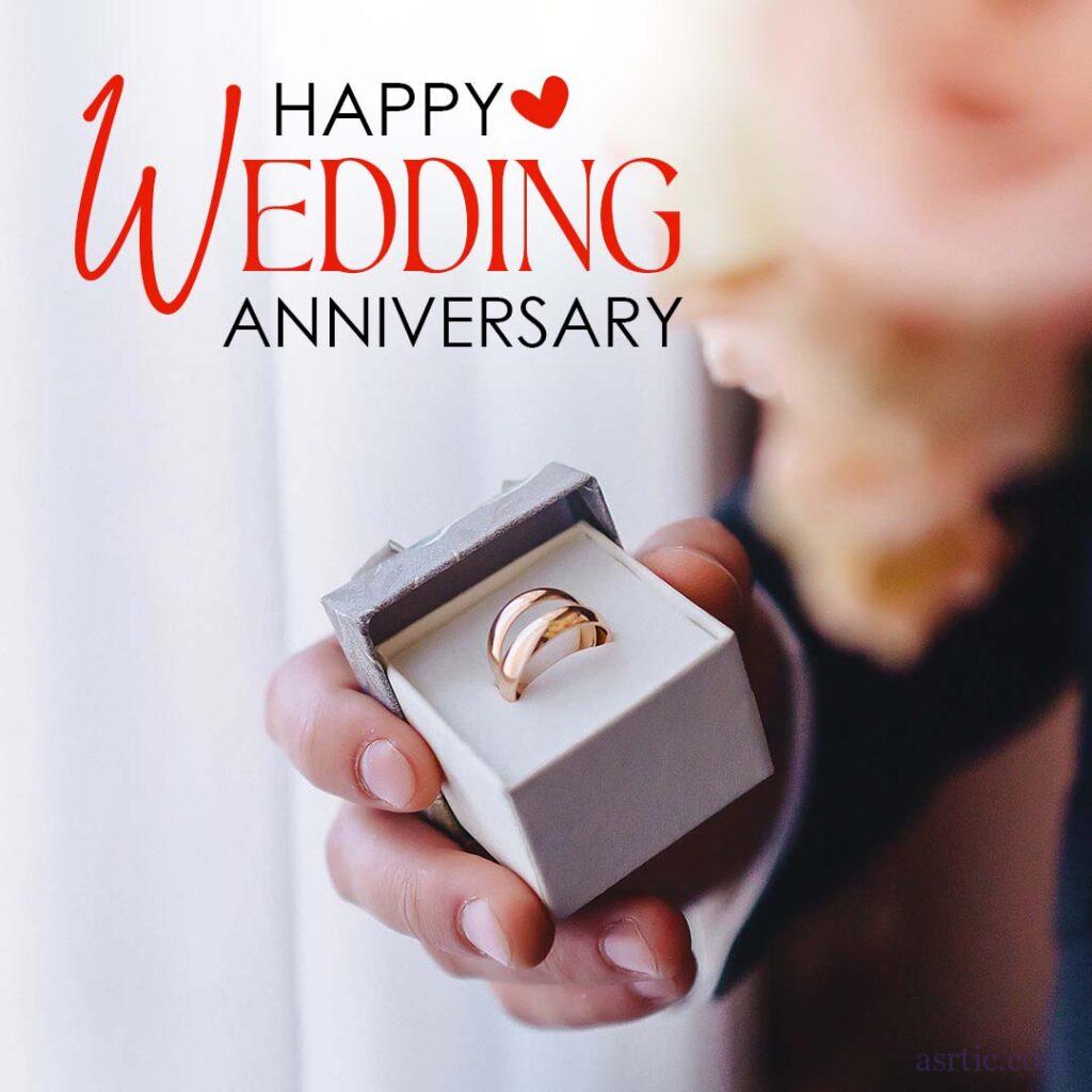 A pair of anniversary rings on a white background