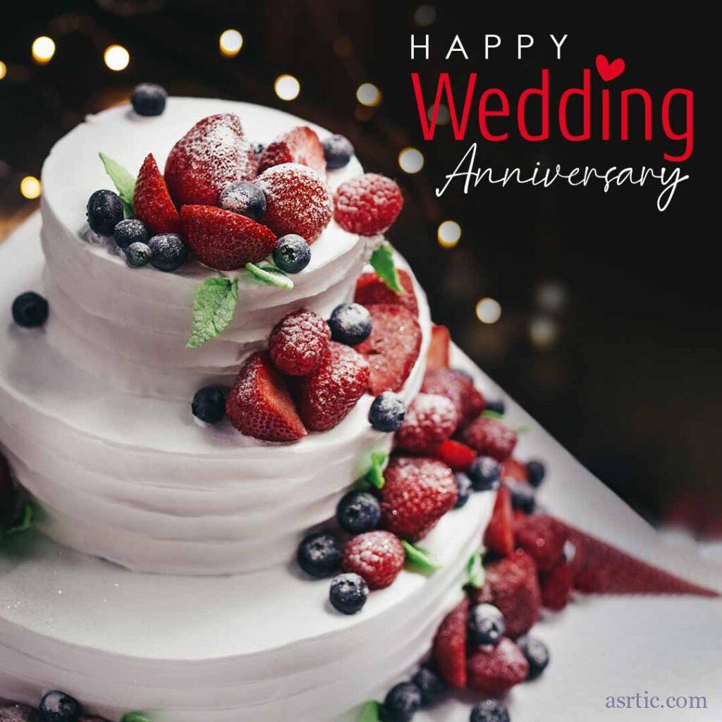A delicious cake with blackberries and strawberries on top, perfect for special occasions like weddings anniversaries.
