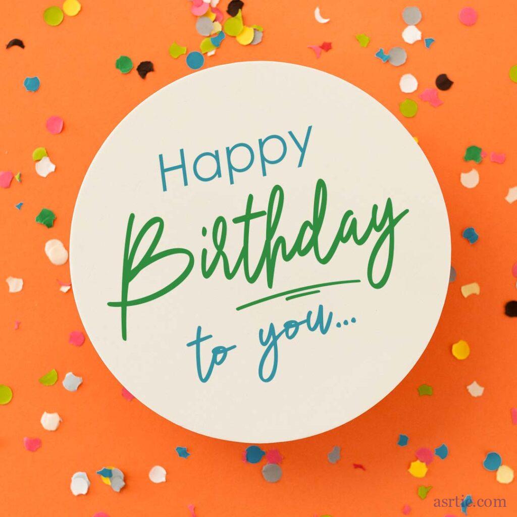 An image of bright paper confetti on an orange background with a sweet birthday phrase in the centre