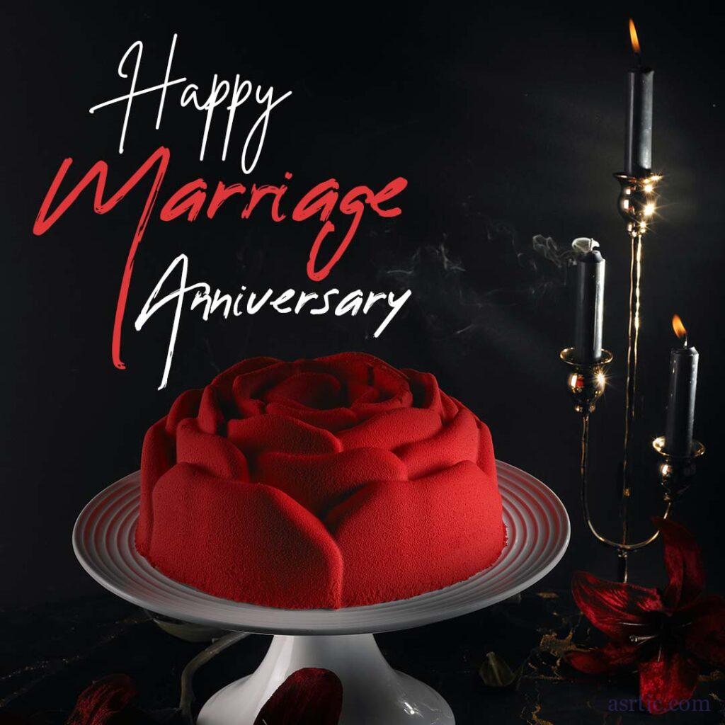 A photo of a candle stand and a red rose-shaped cake on a black background to celebrate a wedding anniversary in style