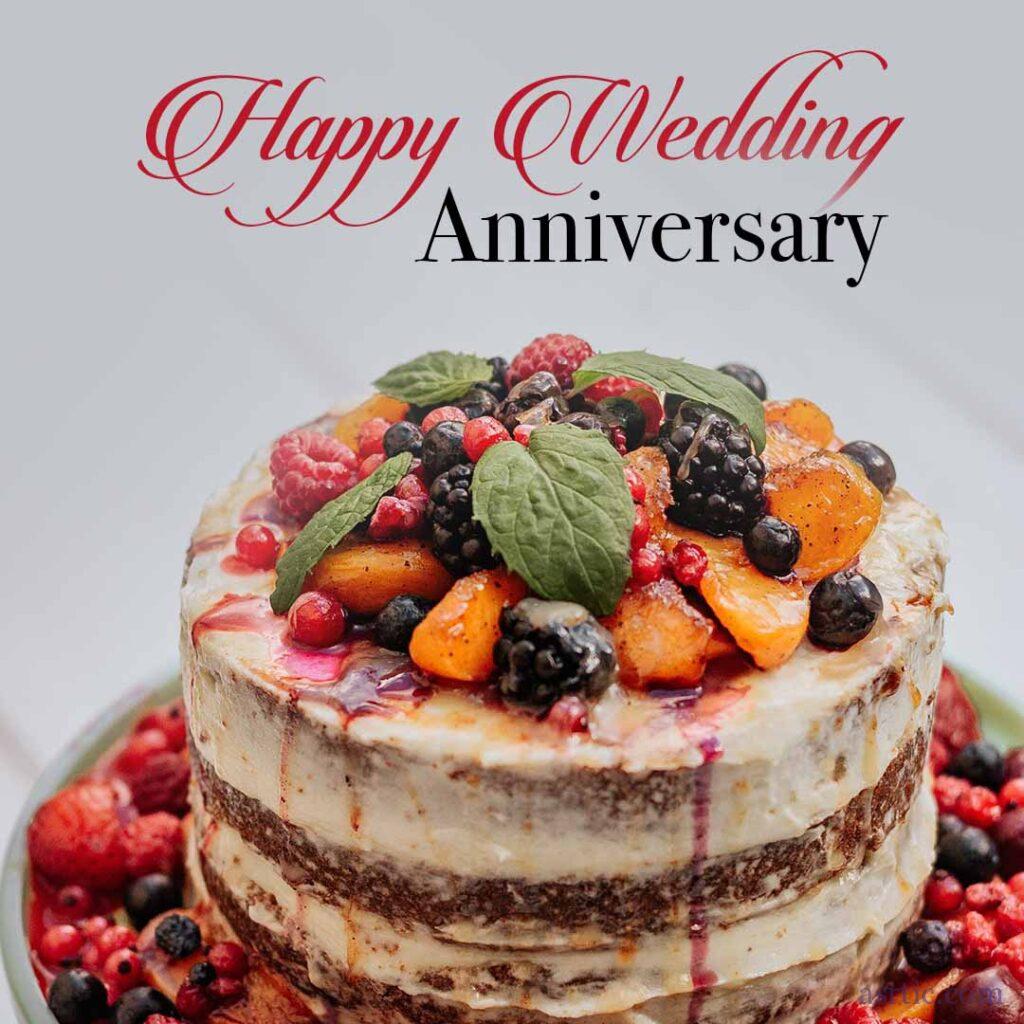 A beautifully decorated fruit cake, perfect for an anniversary celebration