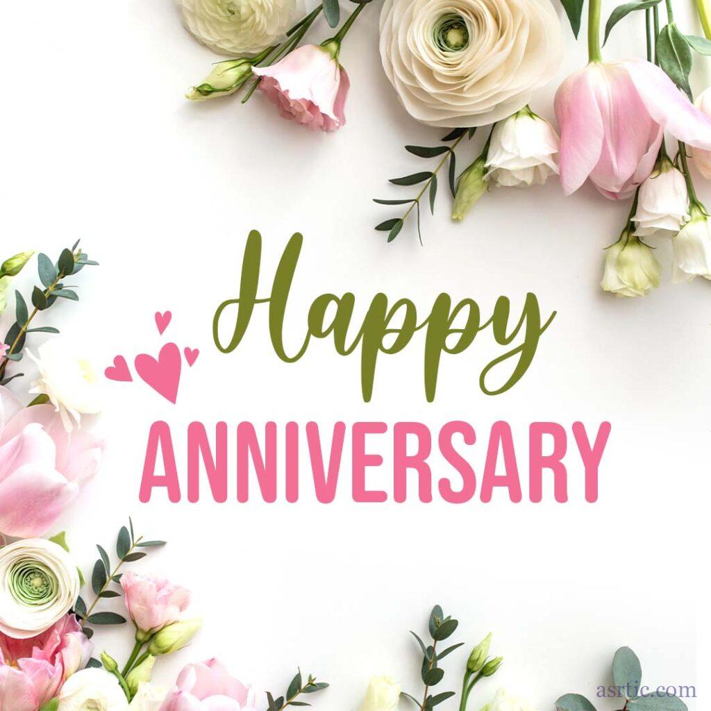 A photo of a border of pink and white flowers on a white background to celebrate an anniversary