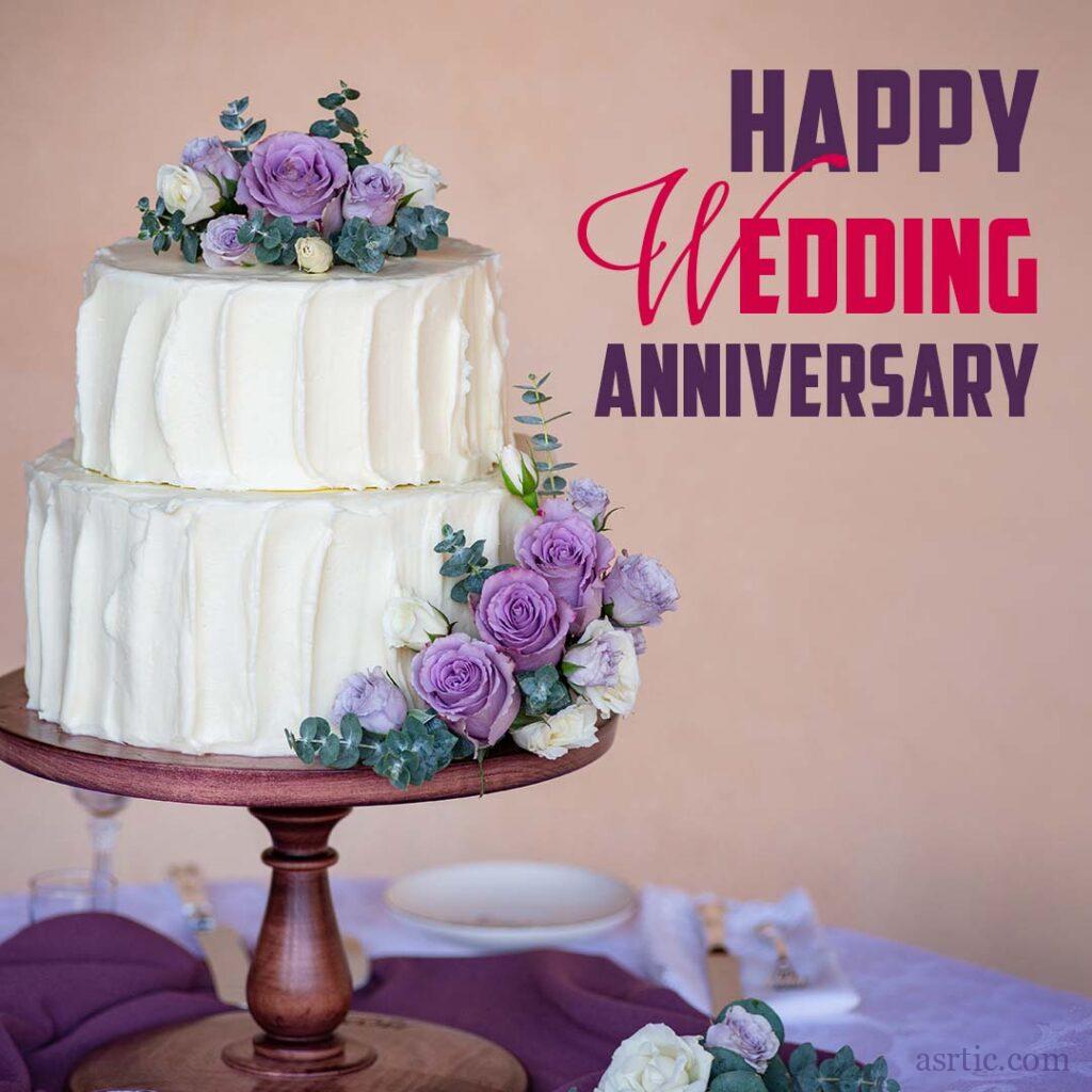 A lovely buttercream cake with purple roses and an anniversary quote.