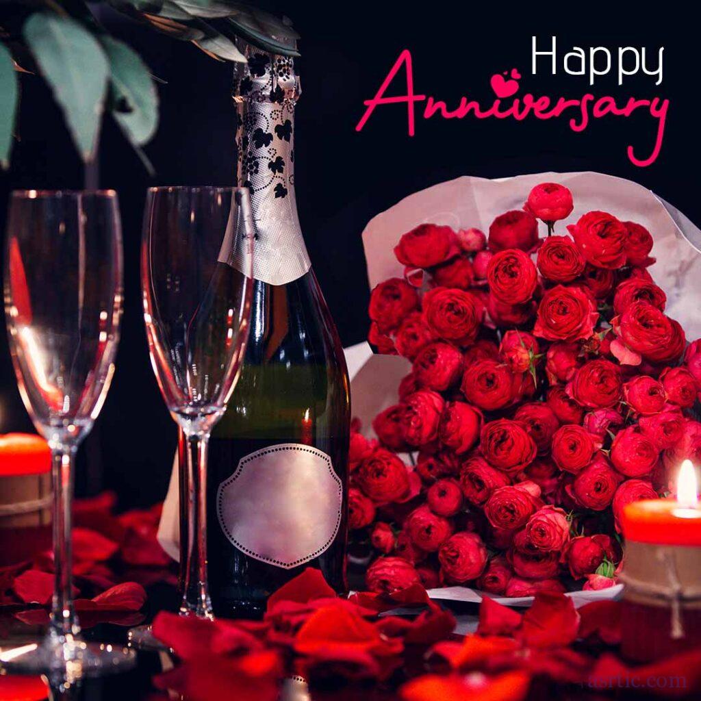 A romantic scene with a champagne bottle and two glasses on a table decorated with red roses for an anniversary theme.
