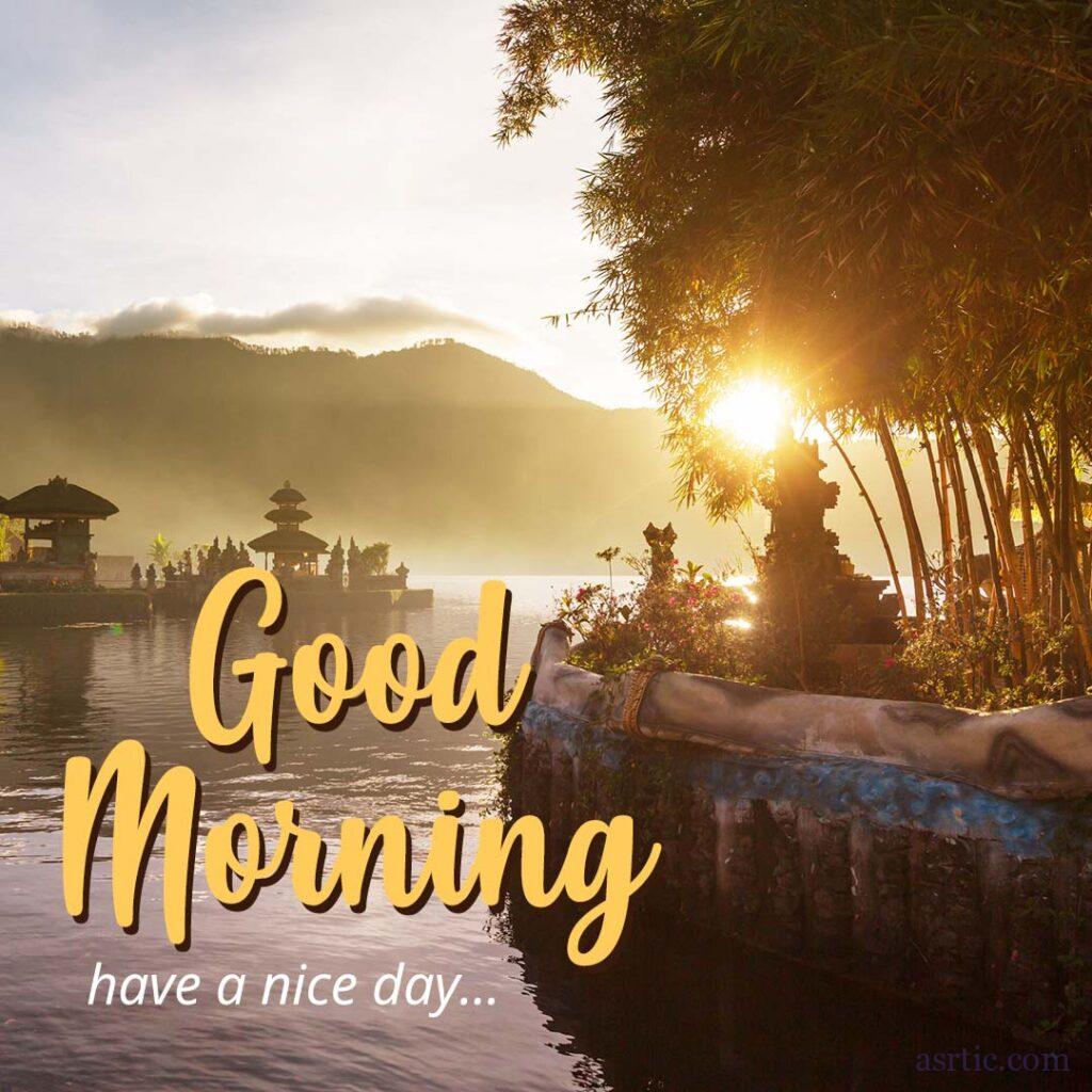 Wish your loved ones a good day with a view of a mountain lake and a brilliant and sparkly sunlight